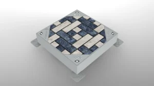 Modern kentsel alanlar ve peyzaj projeleri için peyzaj entegreli, taş dolgulu gizli metal müdahale kapağı uygulaması