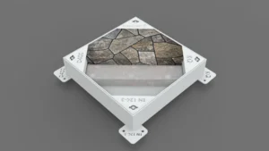 Modern kentsel alanlar ve peyzaj projeleri için peyzaj entegreli, taş dolgulu gizli metal müdahale kapağı uygulaması